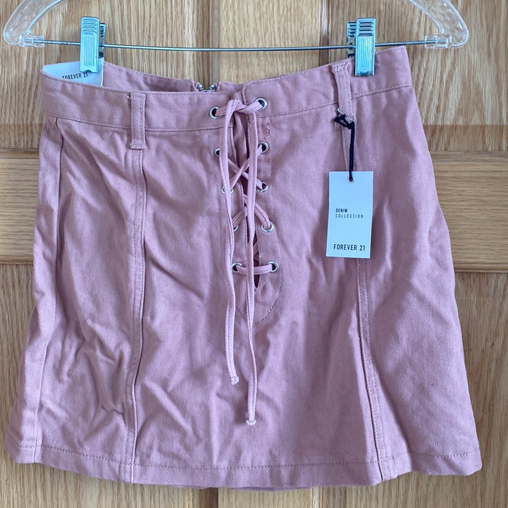 Lace up blush colored denim skirt